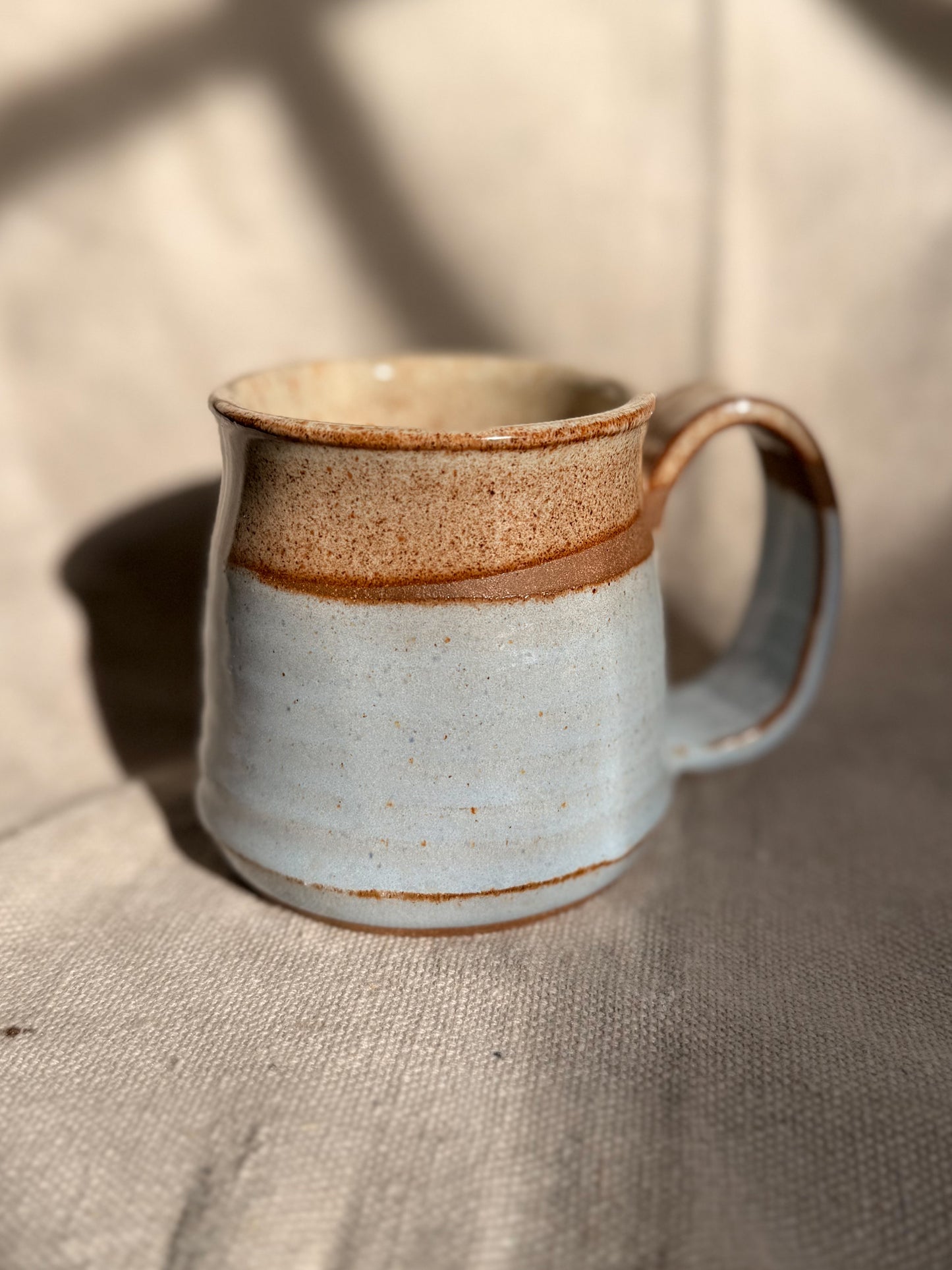 baby blue mug with red dot