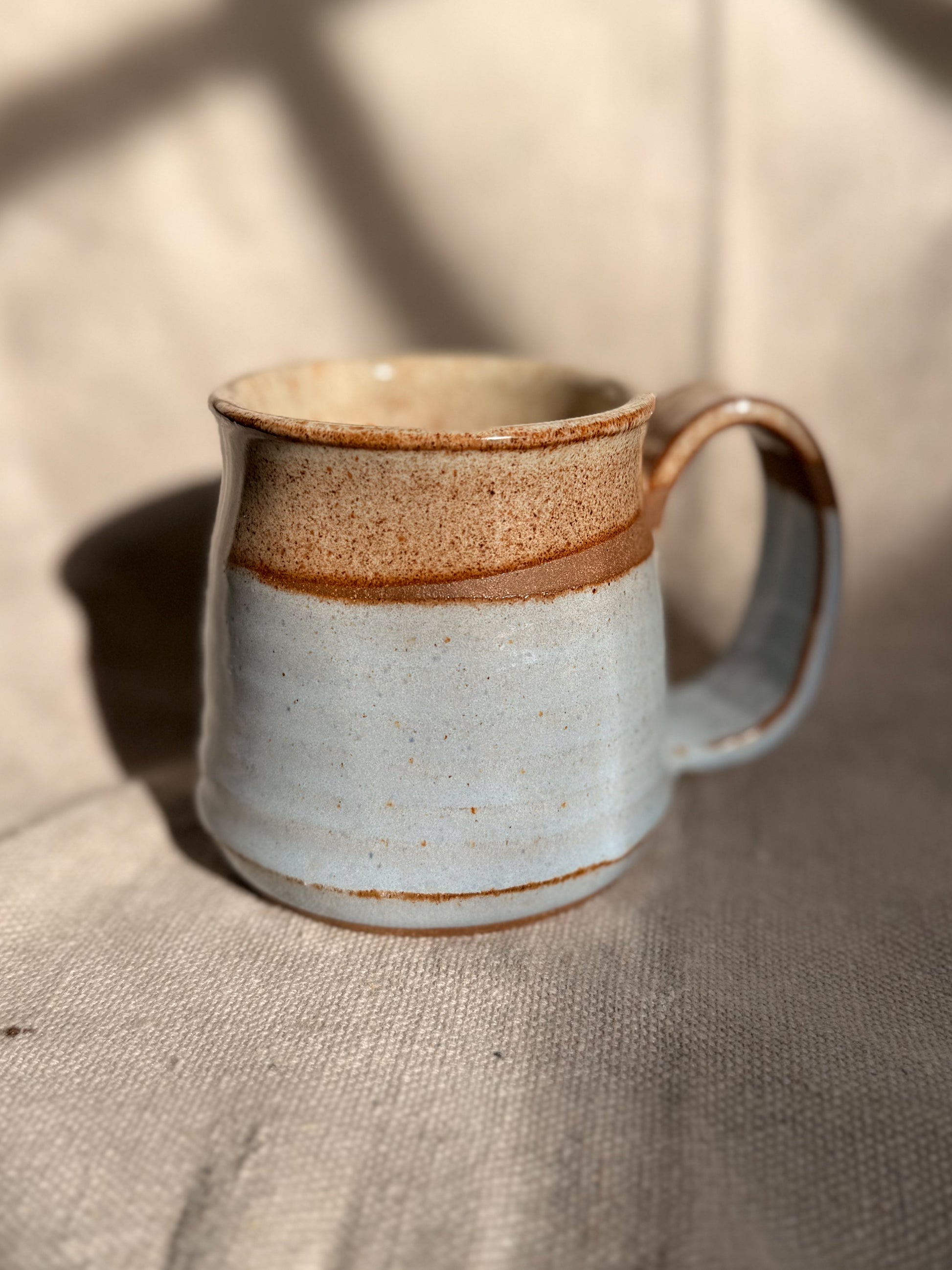 baby blue mug with red dot