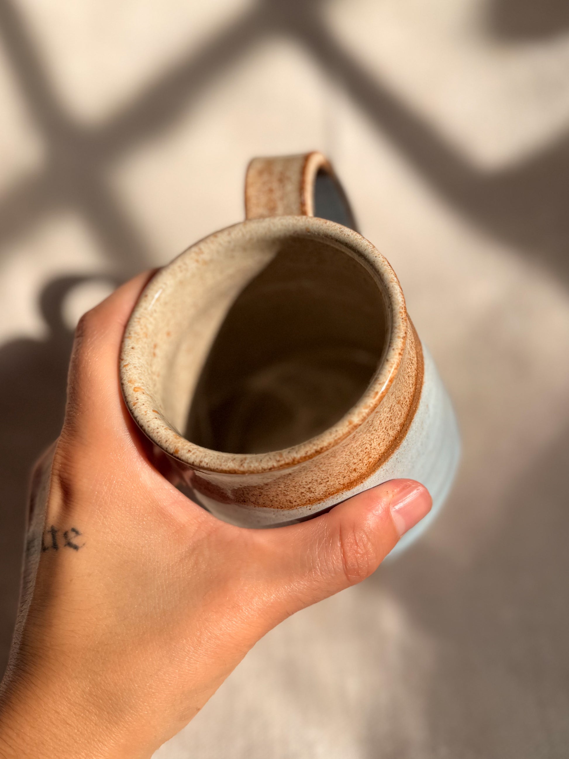 baby blue mug with red dot